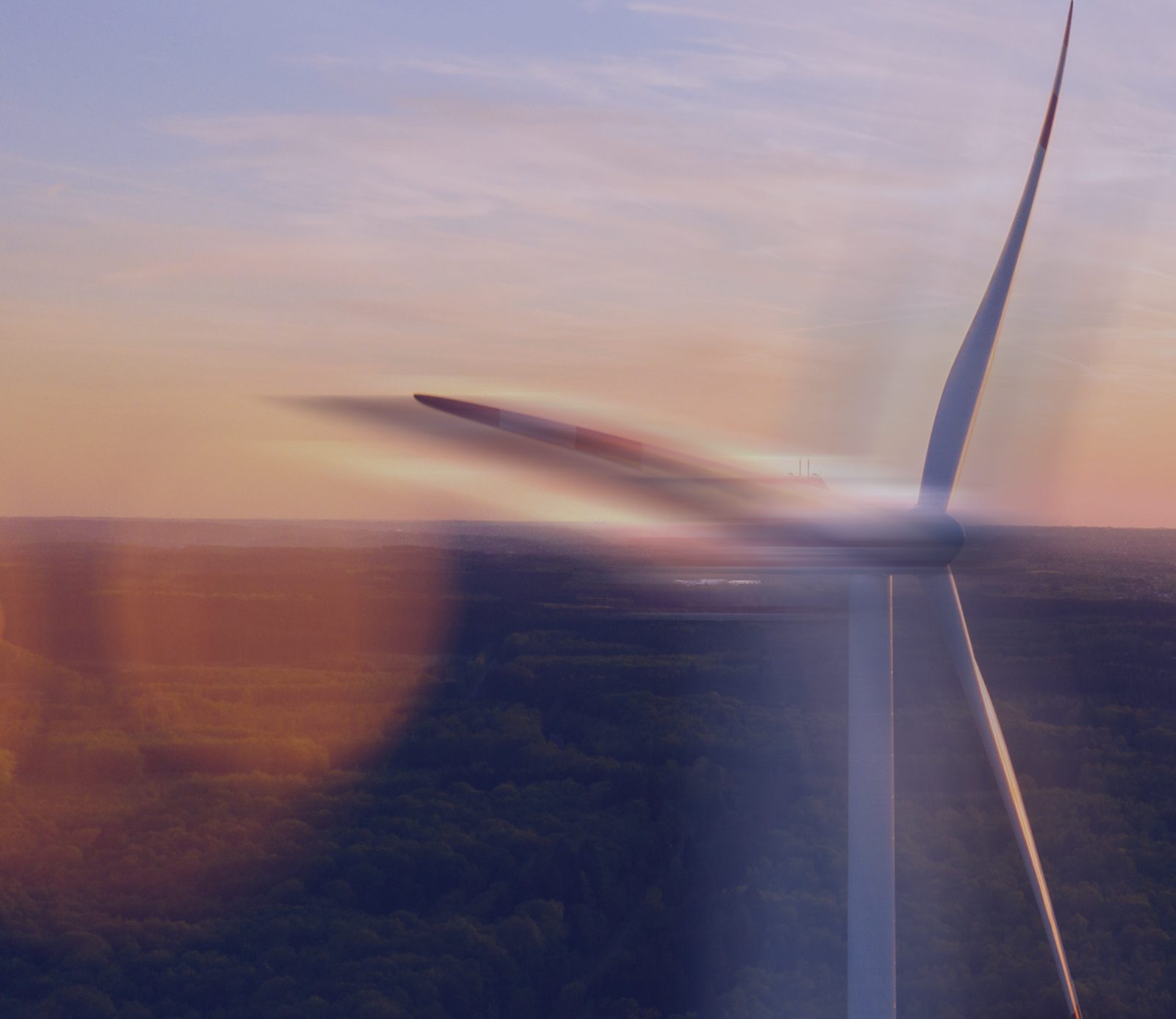 Éolienne au coucher du soleil